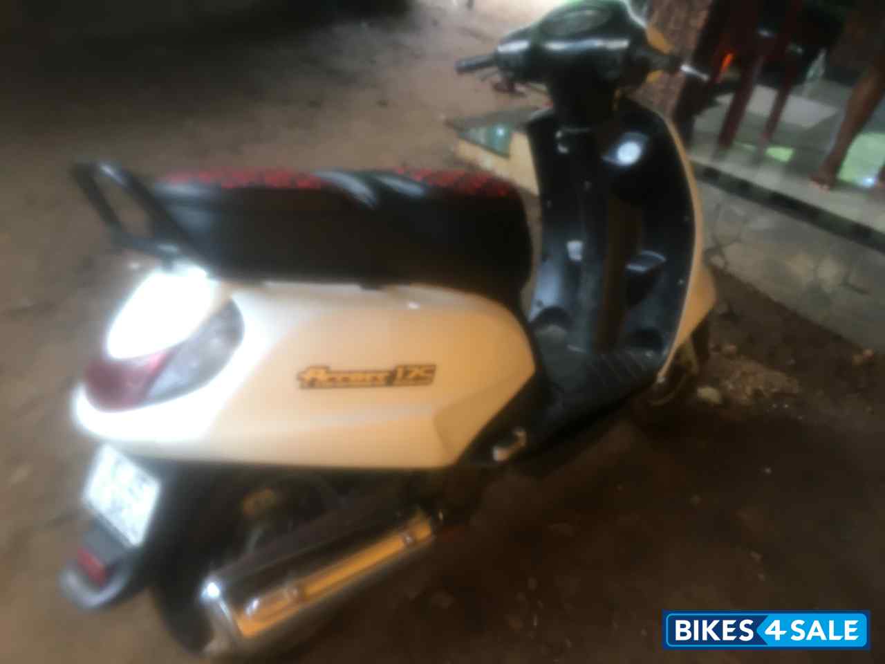 White Suzuki Access 125