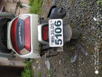 White Mahindra Gusto