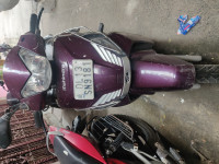 Magenta Mahindra Gusto