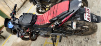 Red And Black Bajaj Pulsar 150 DTSi