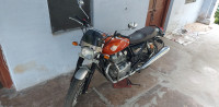 Orange Royal Enfield Interceptor 650 Twin