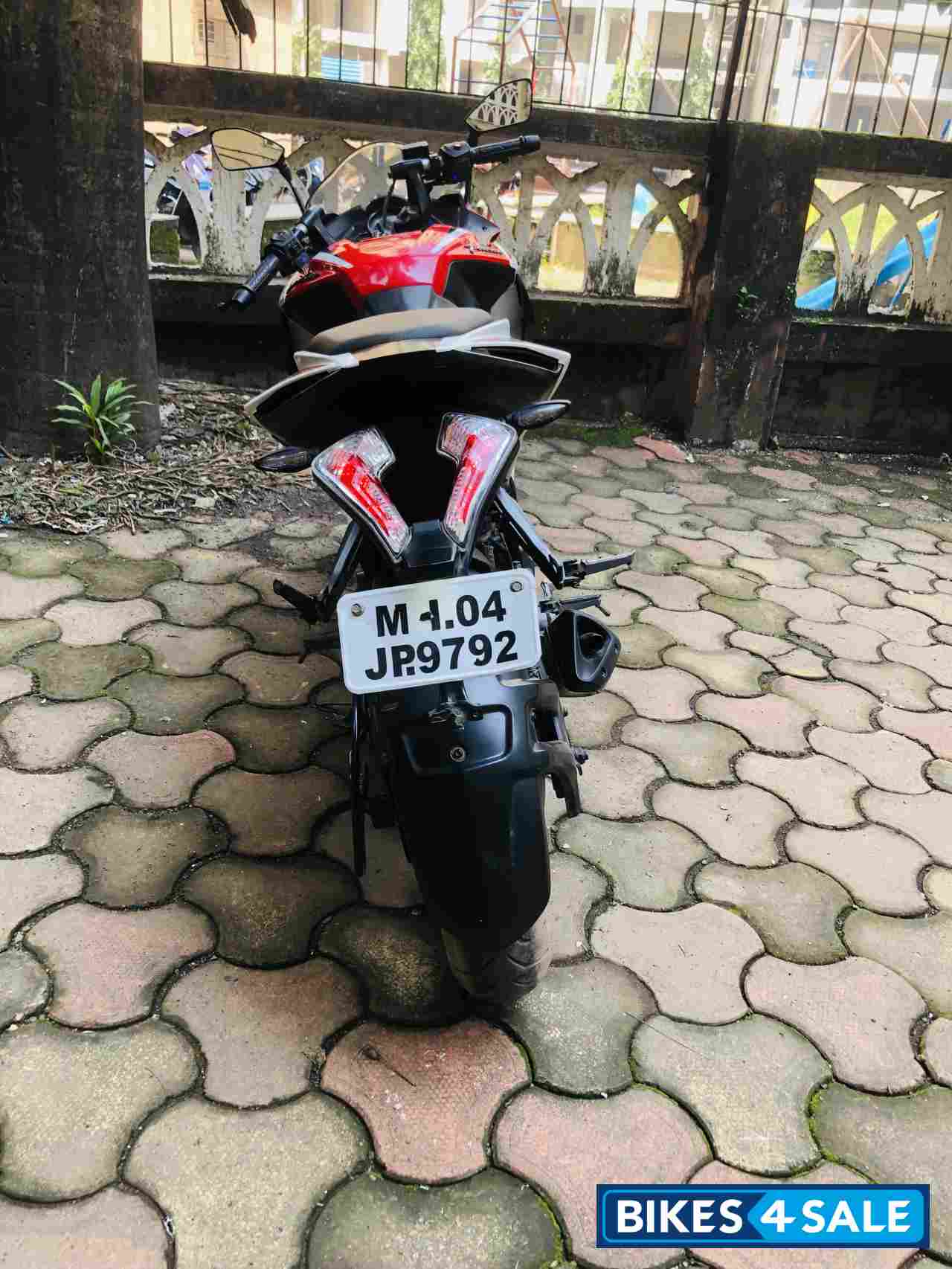 Red And White Bajaj Pulsar RS 200 ABS