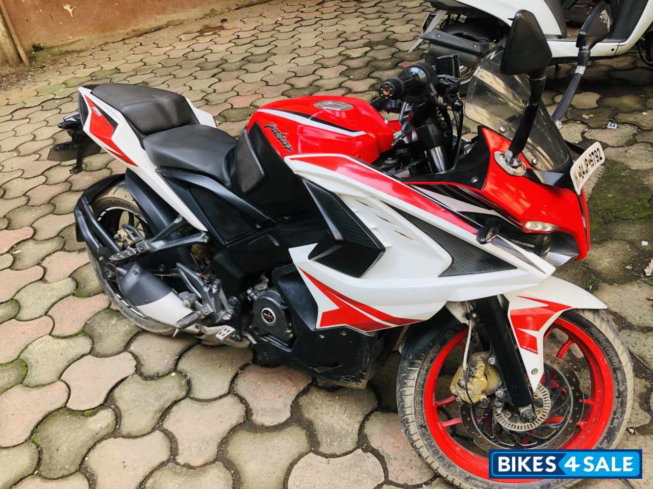 Red And White Bajaj Pulsar RS 200 ABS
