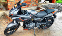 Grey And Orange Neon Bajaj Pulsar 180F Neon