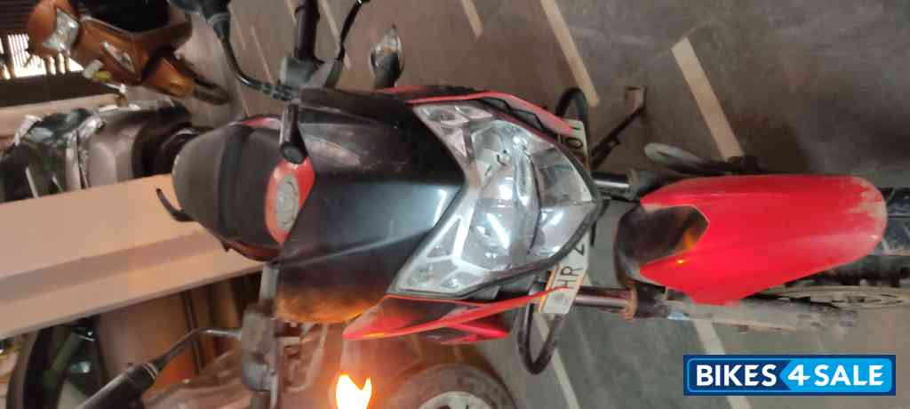 Red Bajaj Pulsar 135LS
