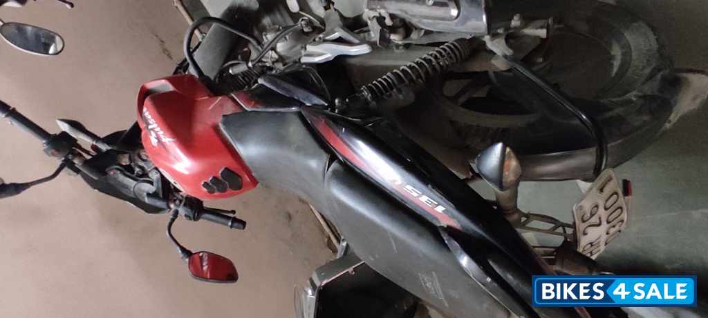 Red Bajaj Pulsar 135LS