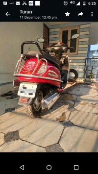 Red Suzuki Access 125