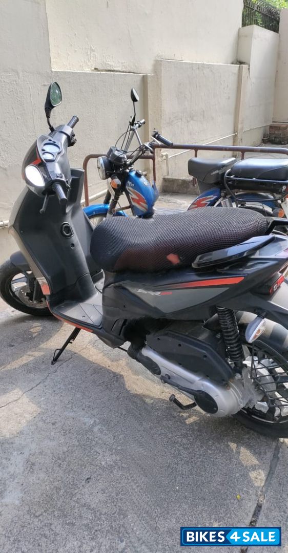 Black Aprilia SR 150