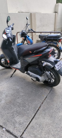 Black Aprilia SR 150