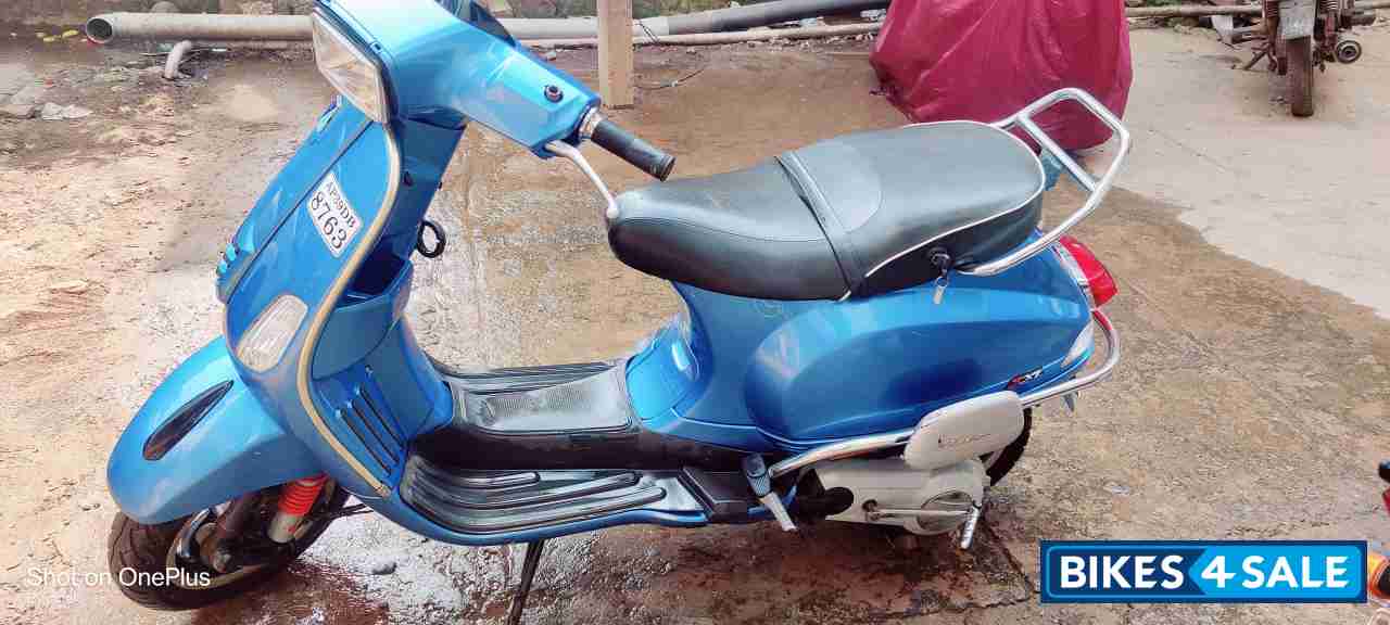 Blue Vespa SXL 125