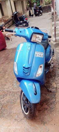 Blue Vespa SXL 125