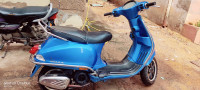 Blue Vespa SXL 125