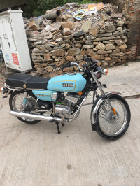Skyblue Yamaha RX 100