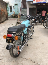 Skyblue Yamaha RX 100