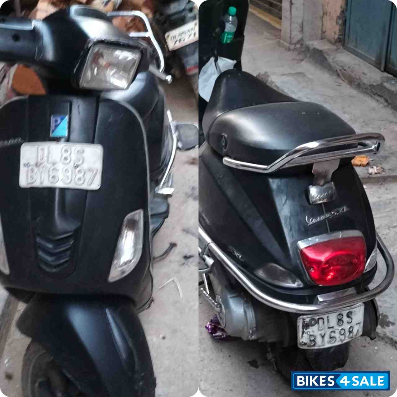 Black Vespa SXL 125