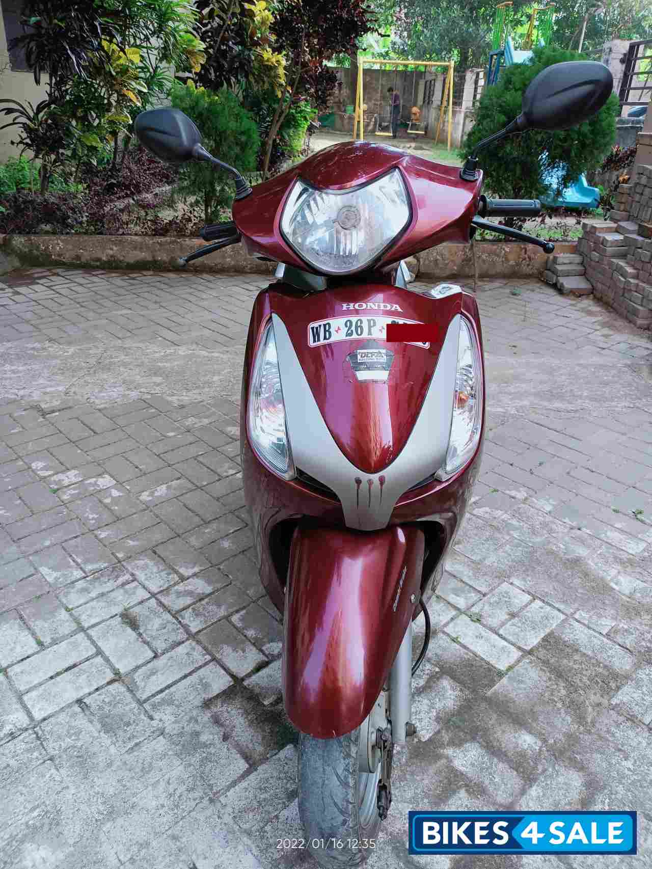 Maroon Honda Aviator