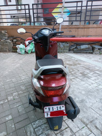 Maroon Honda Aviator