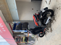 Black Aprilia SR 150