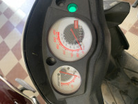 Black Aprilia SR 150