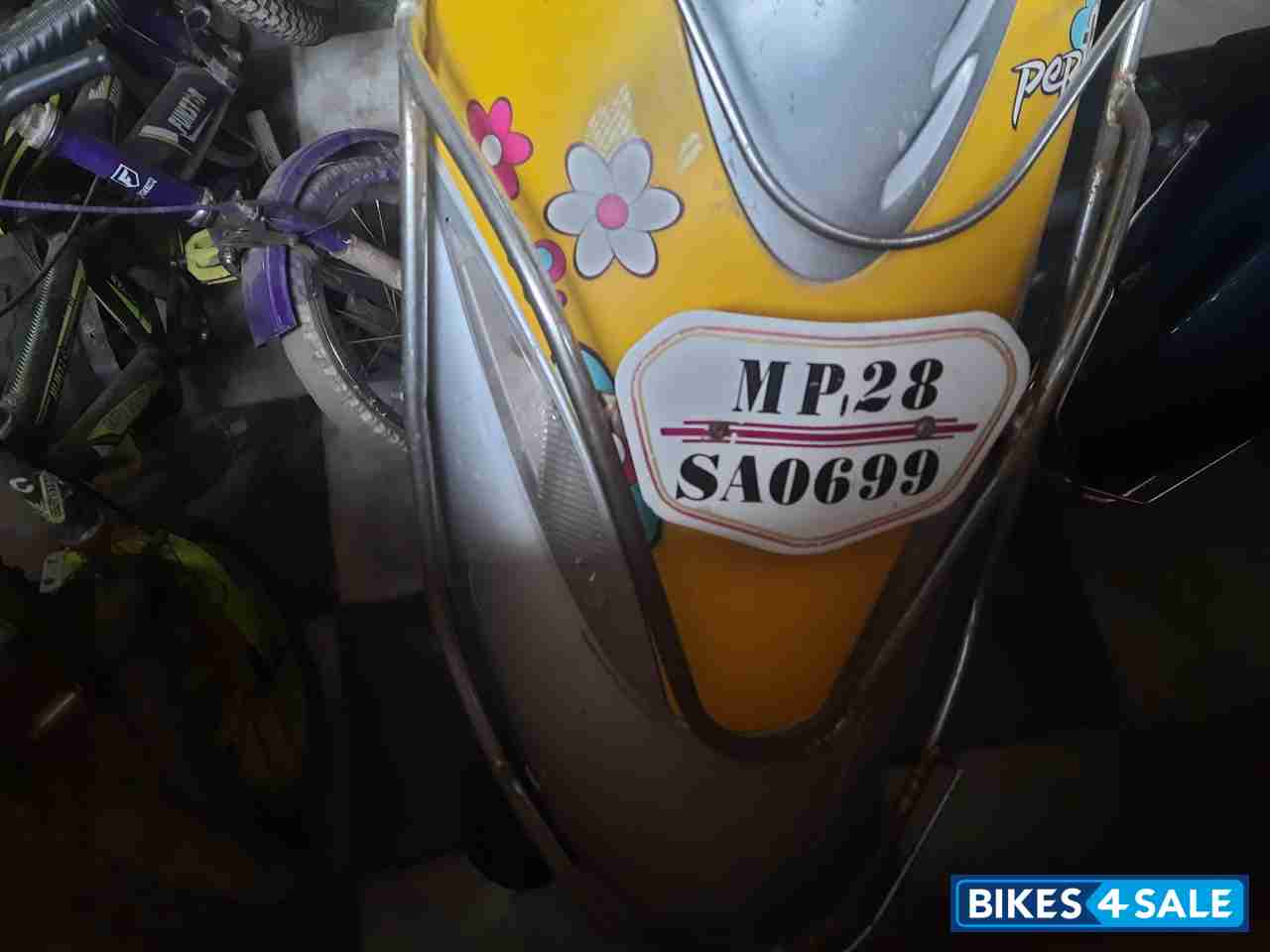 Yellow TVS Scooty Pep