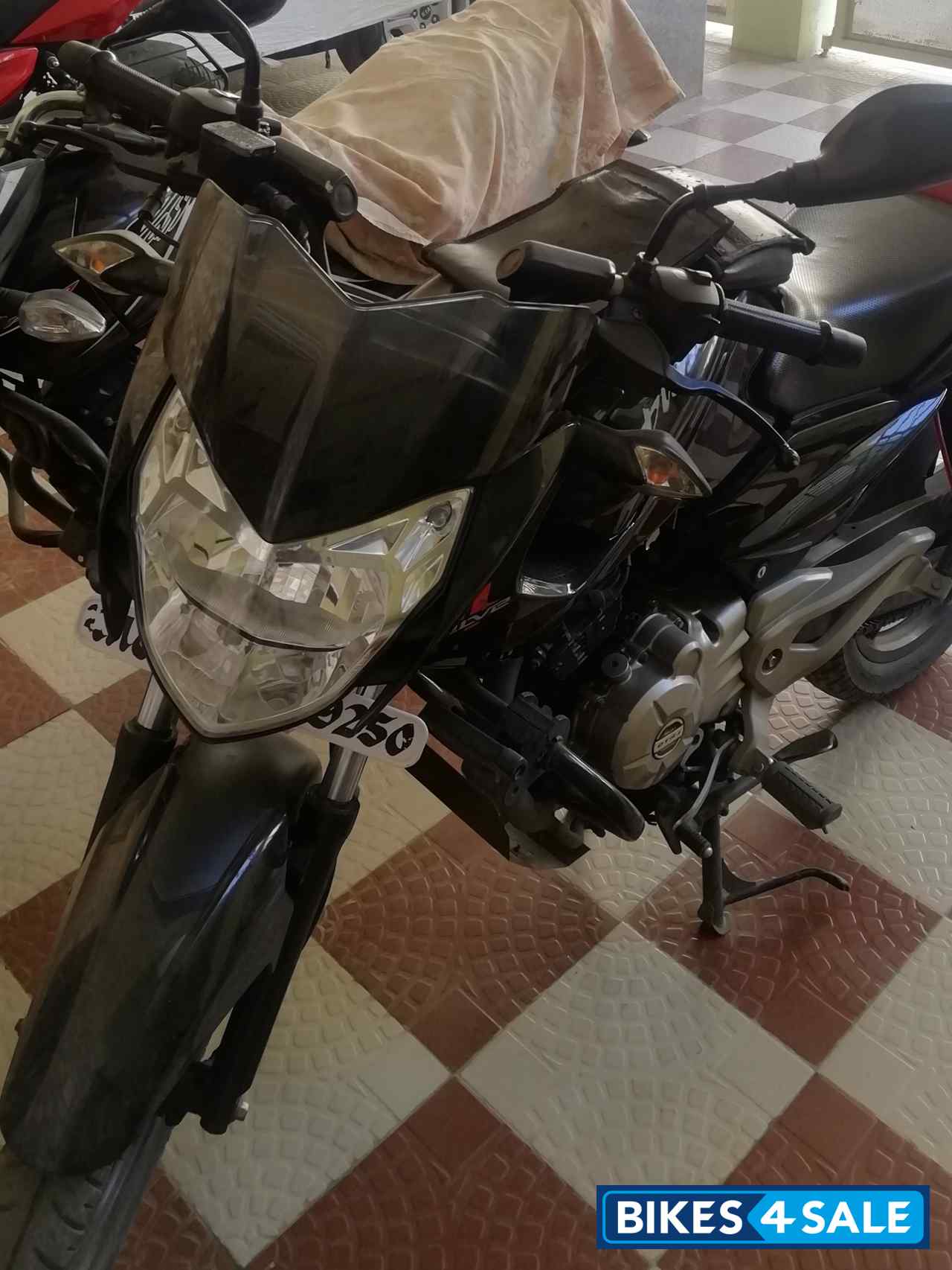 Black Bajaj Pulsar 135LS