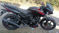 Black And Red Bajaj Pulsar 150 DTSi