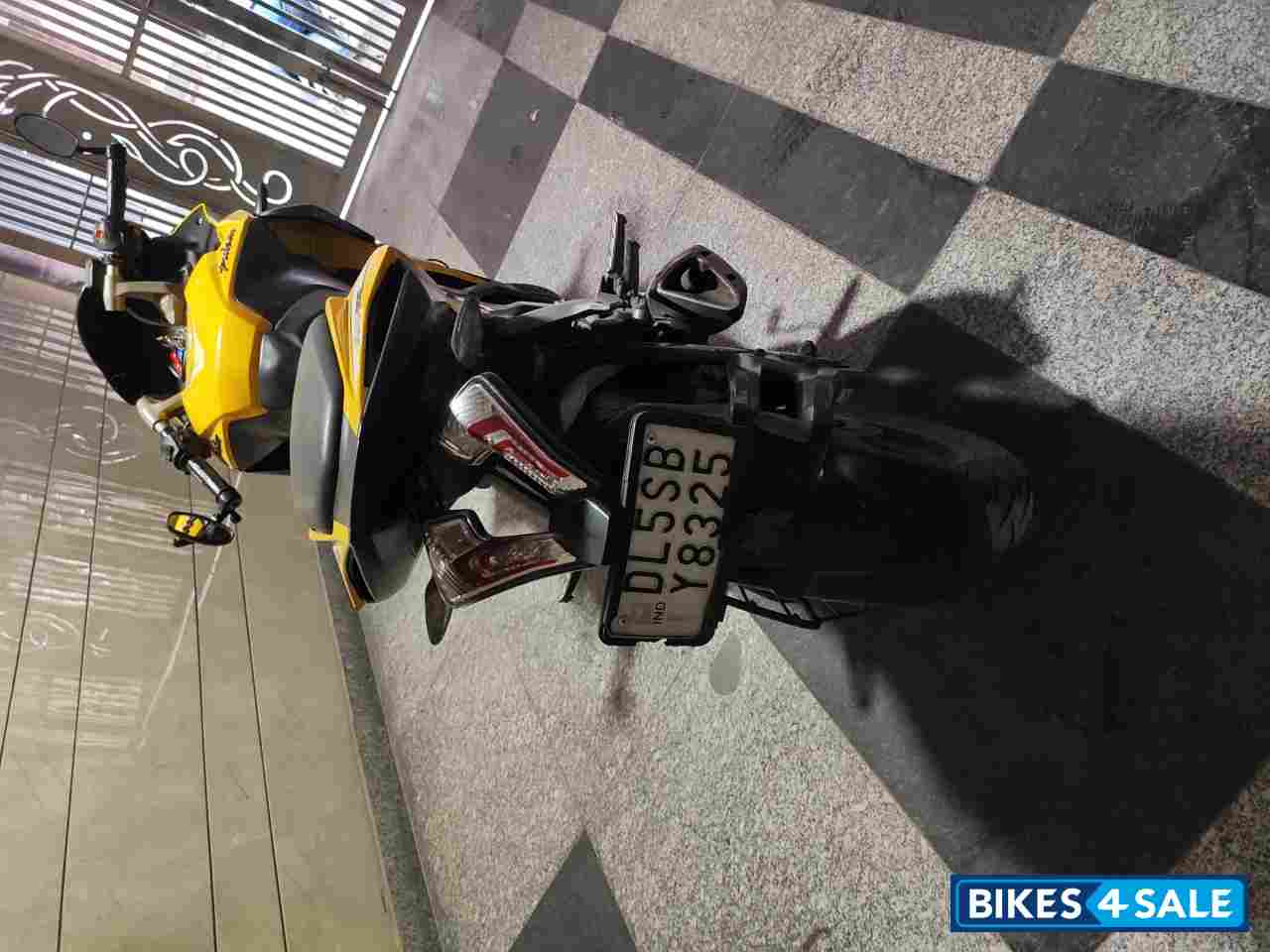 Yellow Bajaj Pulsar RS 200 ABS