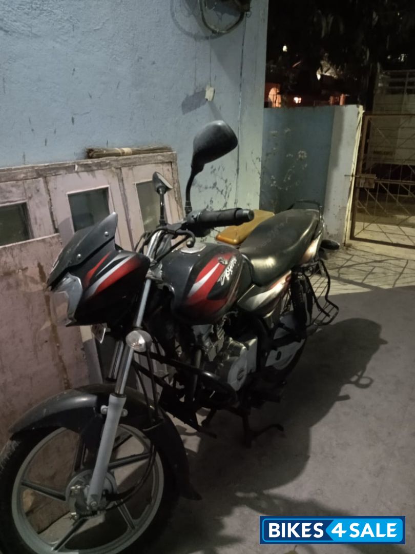 Red And Black Bajaj Discover 125