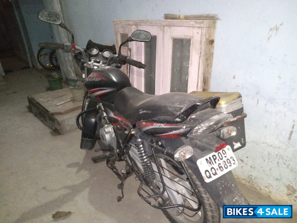 Red And Black Bajaj Discover 125