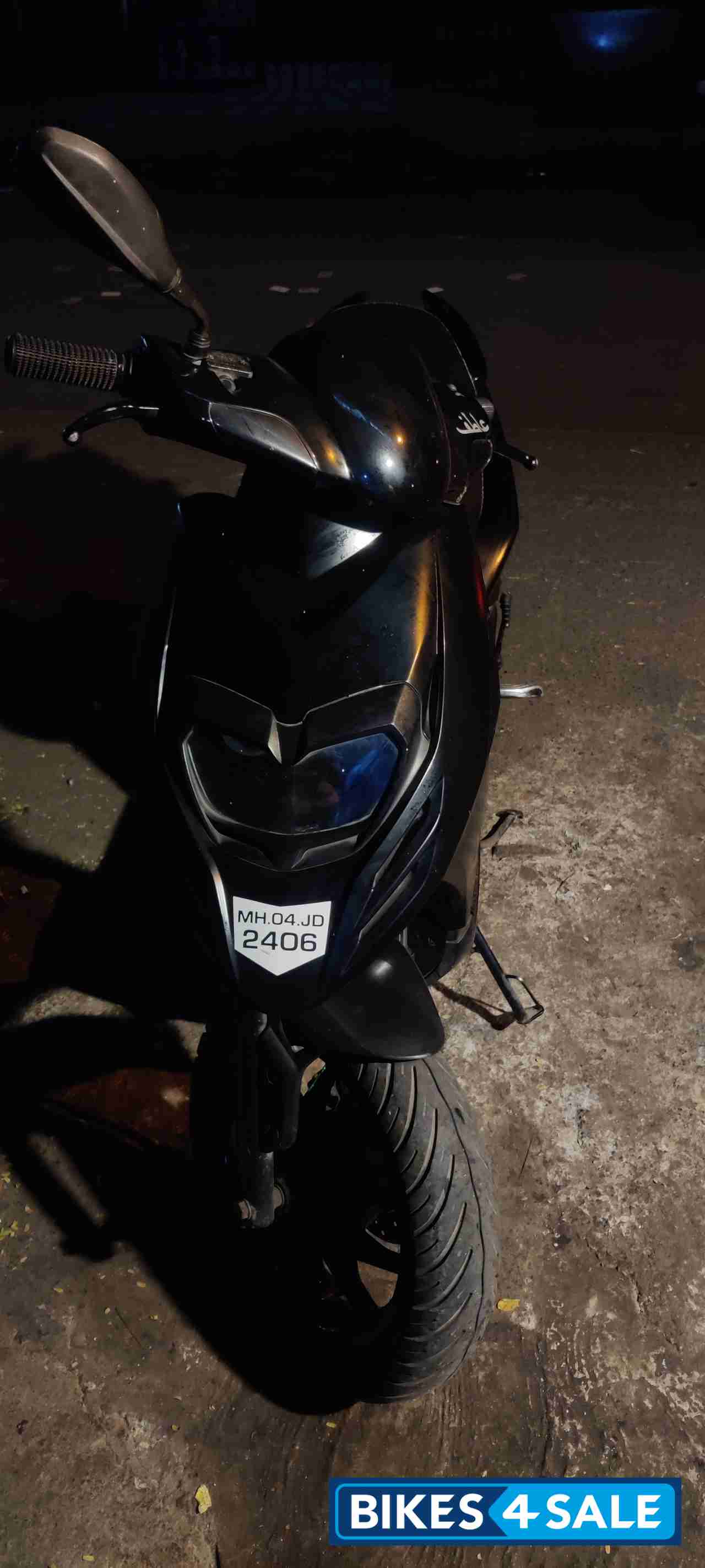 Black Aprilia SR 150