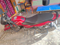 Red Bajaj Pulsar 135LS