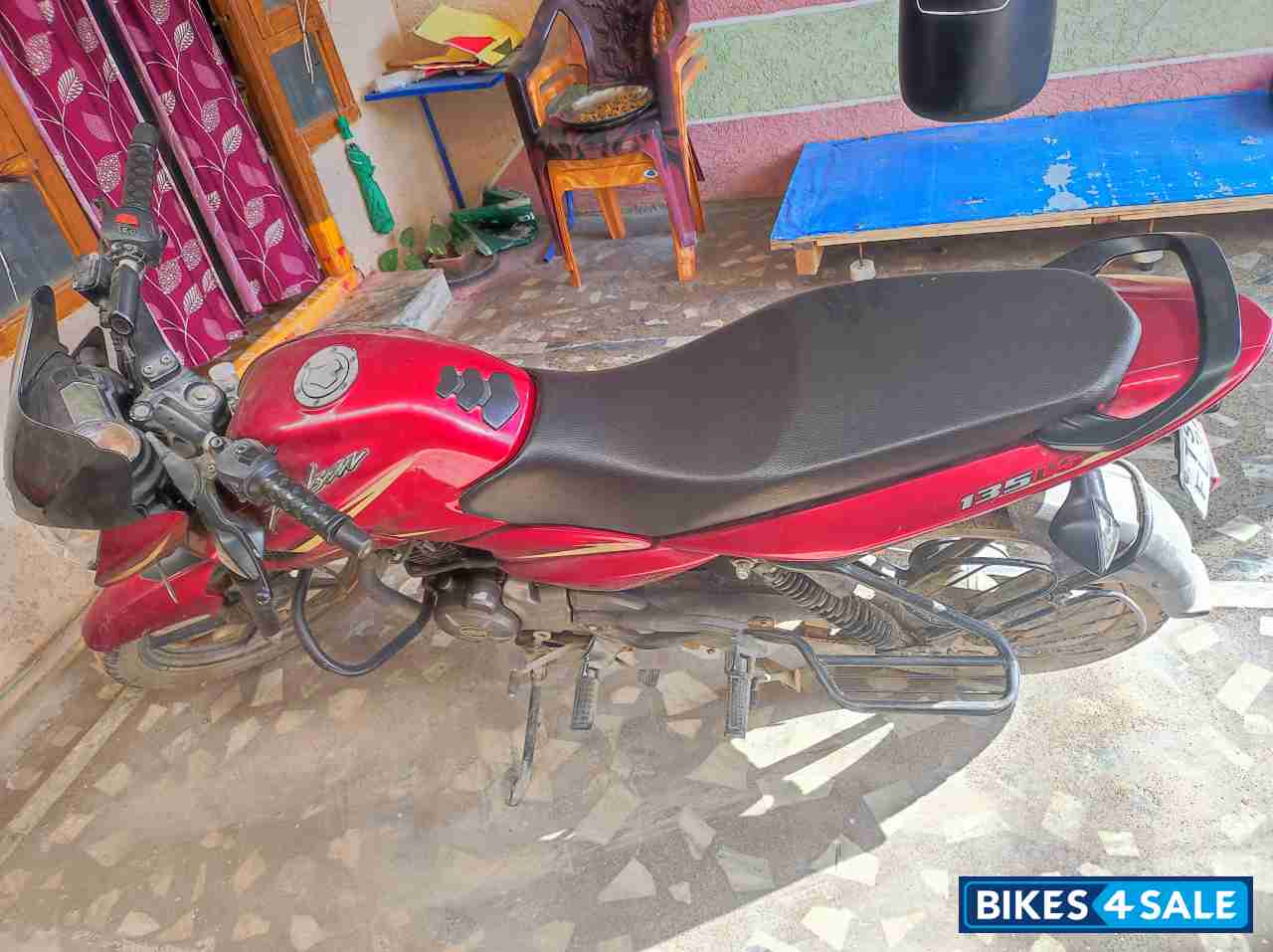 Red Bajaj Pulsar 135LS
