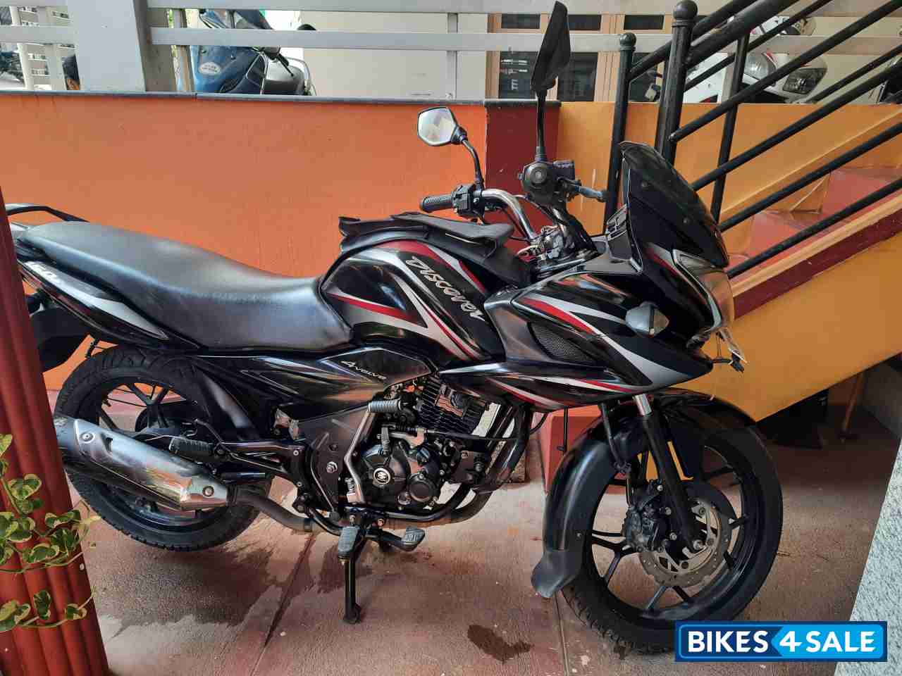 Black & Red Bajaj Discover 150 F