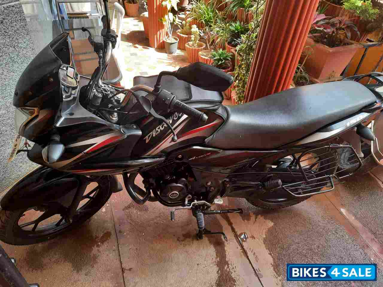 Black & Red Bajaj Discover 150 F