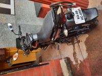 Black & Red Bajaj Discover 150 F