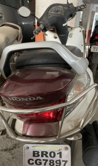 White With Maroon Honda Aviator