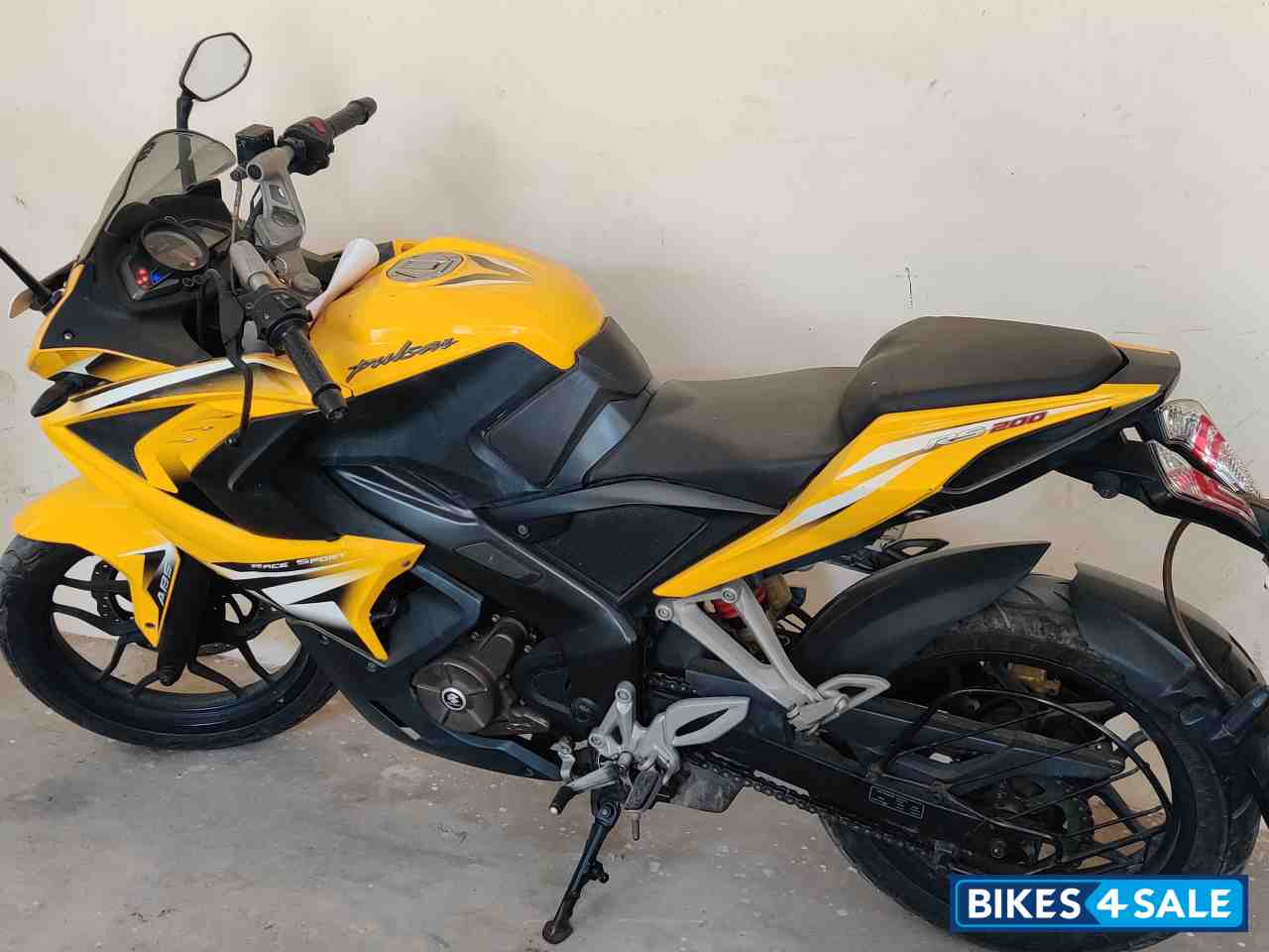Yellow Bajaj Pulsar RS 200 ABS