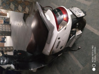 White Mahindra Gusto