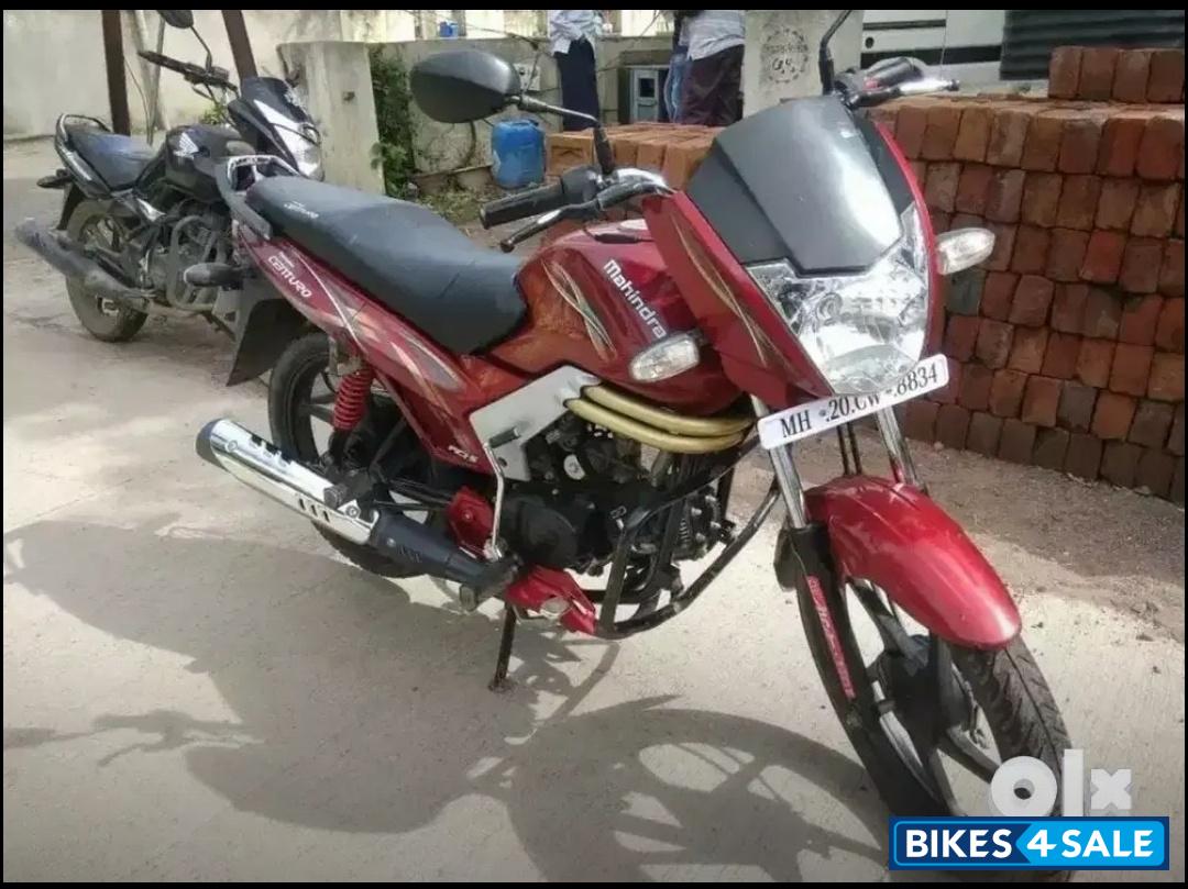 Red Mahindra Centuro