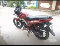 Red Mahindra Centuro