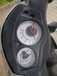 Red Aprilia SR 150 Race