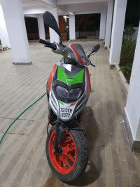 Red Aprilia SR 150 Race