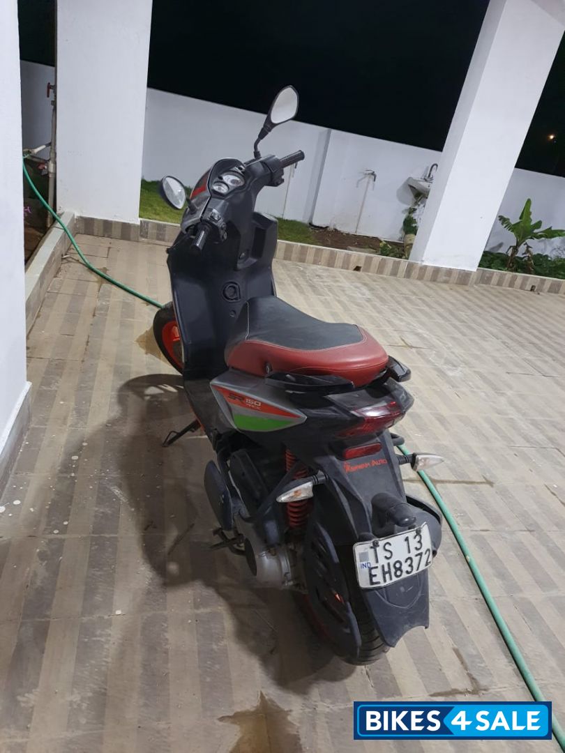 Red Aprilia SR 150 Race