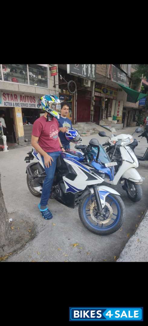 White And Blue Bajaj Pulsar RS 200