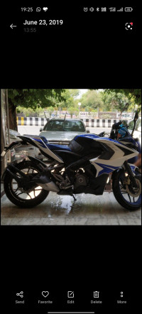 White And Blue Bajaj Pulsar RS 200