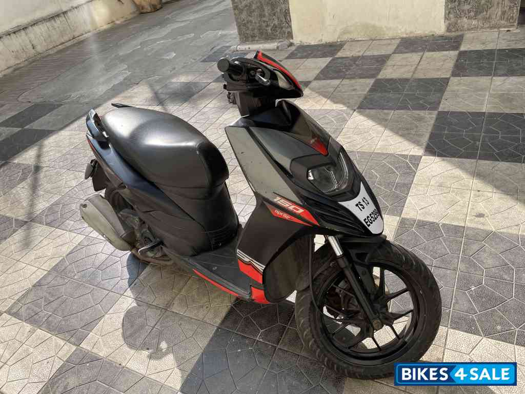 Black Aprilia SR 150