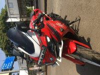 Red TVS Akula 310