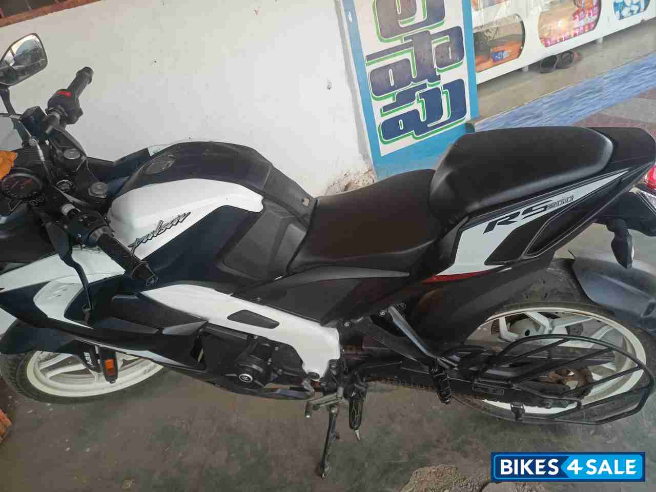 White And Black Bajaj Pulsar RS 200