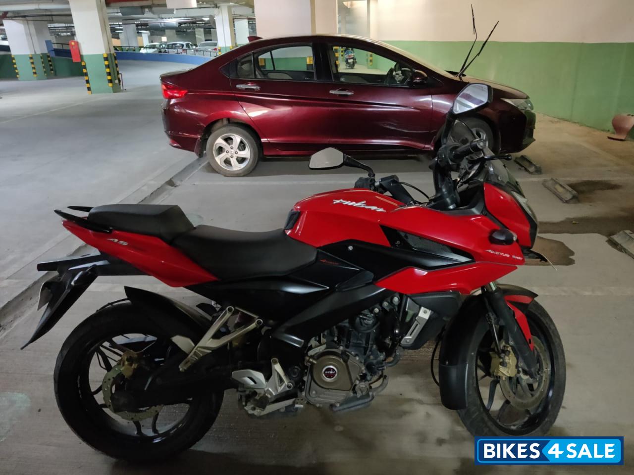Red Bajaj Pulsar AS 200