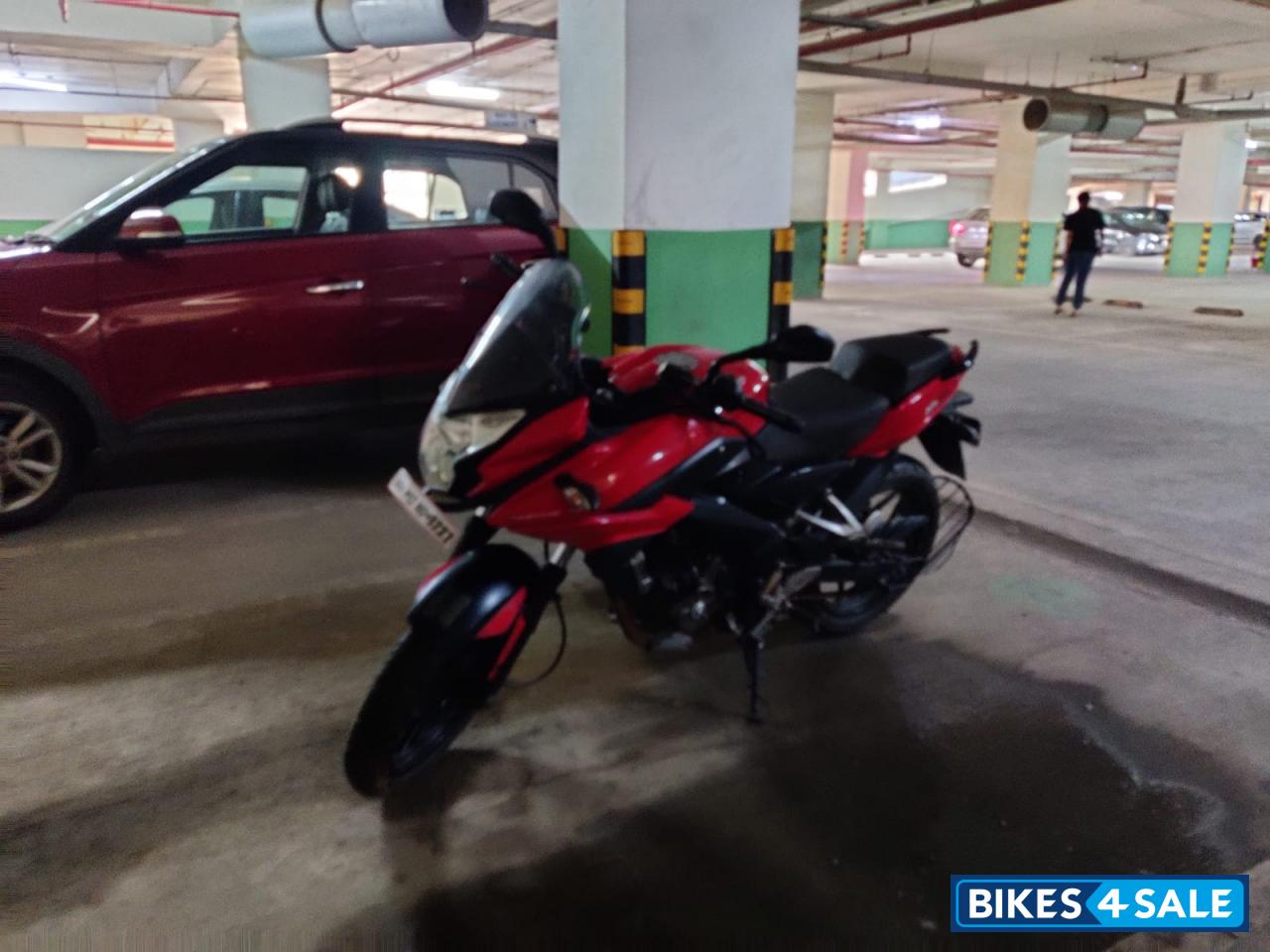 Red Bajaj Pulsar AS 200